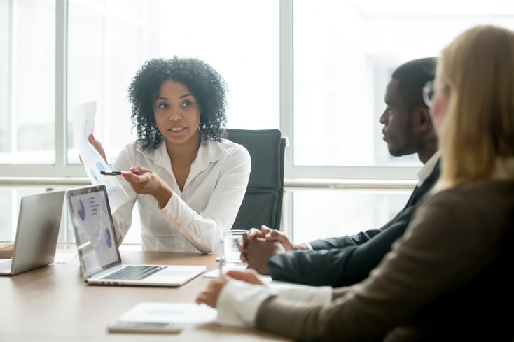 African businesswoman showing good statistics convincing multira