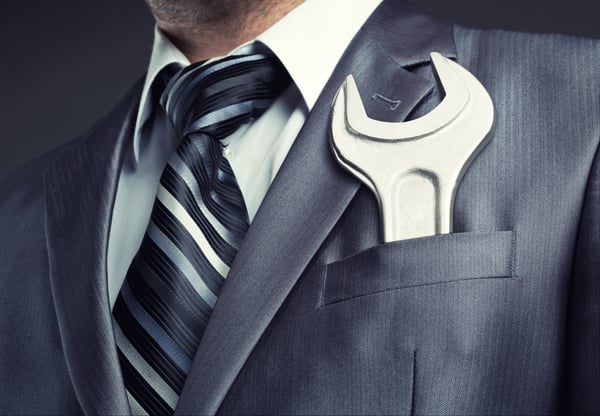 Businessman with spanner