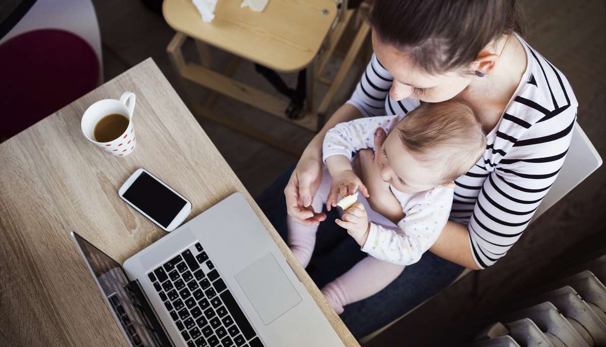 Young mother working from home (R) (S)