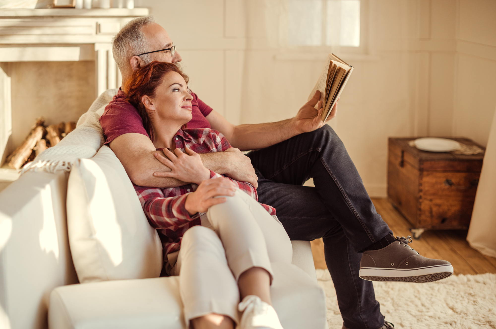 Mature couple relaxing on couch